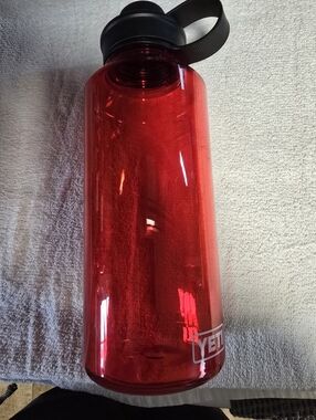 Yeti Red Transparent Insulated Water Bottle with Black Carry Lid 50oz